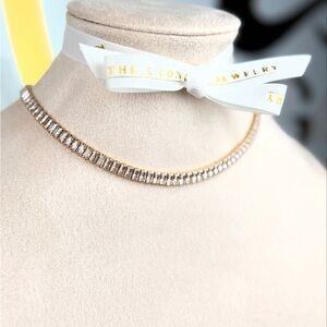 Elegant Gold and Silver Necklace